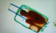 Photo of X-ray scan at Spanish border finds child stashed inside suitcase