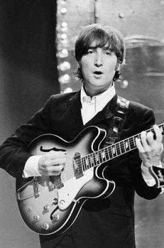 Photo of John Lennon’s guitar sells for $2.4 million at auction